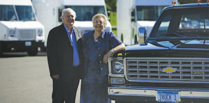 Spee-Dee Delivery Founders Don and Sylvia standing beside truck 1 in St. Cloud, Minnesota